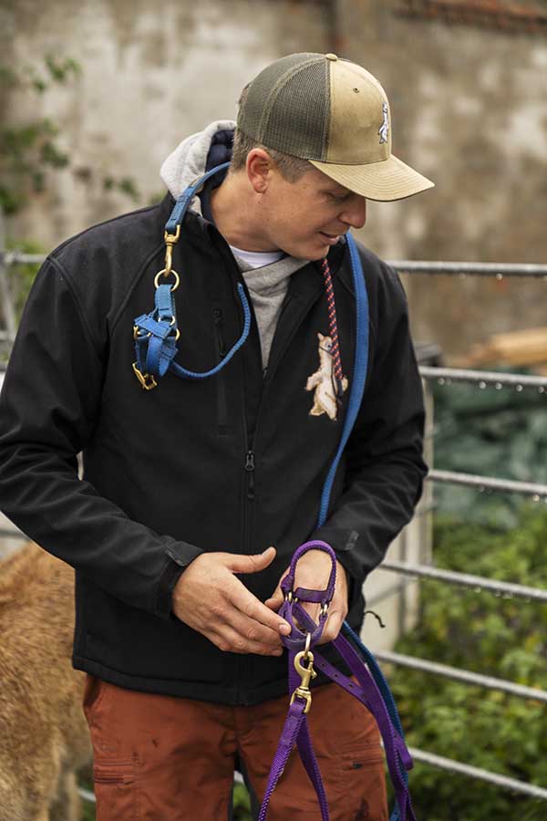 Man at a llama farm